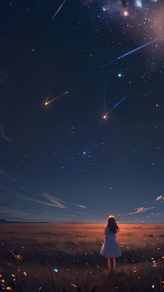 a girl looking up at the stars in the sky