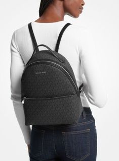 From gym sessions to city commutes, our Sheila backpack has you covered. The Signature Logo-print canvas style comes with a dedicated pocket inside for your tablet, as well as a front zip pouch for smaller items. Adjust the buckled \ straps on the back for the perfect drop. Nylon Backpack With Logo For Everyday Use, Everyday Nylon Backpack With Logo, Trendy Travel Backpack With Logo, Daily Coated Canvas Backpack With Logo, Daily Use Coated Canvas Backpack With Logo, Daily Use Backpack In Coated Canvas With Logo, Travel Backpack In Coated Canvas With Logo, Travel Backpack With Logo In Coated Canvas, School Backpack With Adjustable Strap In Coated Canvas