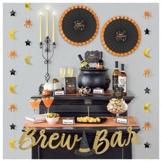 a bar decorated for halloween with gold decorations