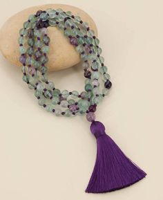 Fluorite has a calming energy that grounds the spirit. It clears away foggy and cluttered thinking, making it excellent for meditation. Fluorite heightens intuitive powers and connects us to the higher spirit within us. Knotted gemstone mala Made of 108 Fluorite gemstone beads Also features a guru bead and tassel Available in two different bead sizes, 6mm and 8mm Made in India, ships from our USA based warehouse For meditation use only, not recommended as a jewelry item Crafted using natural gem Buddha Groove, Fluorite Gemstone, Mala Meditation, Bead Sizes, 108 Bead, The Spirit, Gemstone Beads, Natural Gemstones, Meditation