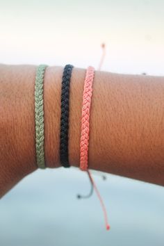 "These braided bracelets are perfect for summer! DETAILS -Waterproof  -Bracelets adjustable from around 5.5\"-10.5\" -Anklets adjustable from around 7.5\"-13.25\" MATERIALS -Waxed cord COLOURS -White -Black -Coral -Light Blue -Mint blue -Light Purple -Light Taupe -Light Green -Dark Blue -Pink SHIPPING - 1-4 business days for processing - 1-2 weeks shipping to Canada JEWELRY AND SIZING -If you have any concerns about sizing message me and I can accommodate to your needs -Each bracelet is handmade and not every bracelet will be identical RETURNS AND EXCHANGES I do not accept returns or exchanges but if you have any concerns with your order let me know. FOLLOW US! Instagram: Jasmineandshae" Braided Anklets Diy, Twine Bracelets, Waterproof Bracelets, Anklets Diy, Diy Bracelets With String, Braid Bracelet, Wax Cord Bracelet, Summer Details, Bracelets Adjustable