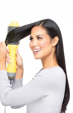 What it is: A tool that combines the hot air of a blow-dryer with the structure of a round brush to create a smooth, shiny blowout with tons of volume.What it does: This quick, one-step tool features Ionic Technology to reduce frizz and add tons of shine while styling.Features and benefits:- Strategically-placed vents provide maximum airflow for a faster blowout.- An ergonomic, lightweight design provides maximum comfort.- A combination of nylon and tufted bristles allows for exceptional tension Blowout With Volume, Round Hair Brush, Blow Dry Brush, Double Shot, Round Brush, Blow Dryer, Dry Brushing, The Double, Hair Brush