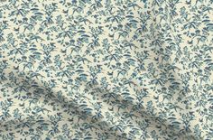 a blue and white floral print fabric