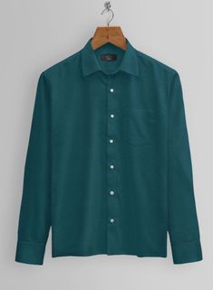 Our Giza Teal Cotton Shirt not only tantalizes your eyes but also pleases your senses. Crafted from top-notch cotton fabric, it is soft and lightweight, providing a smooth touch. The dazzling teal color and solid pattern exude elegance and fashion, granting you an exquisite look.  This shirt instills a sense of confidence whenever you step out of the house. It is incredibly comfortable to wear and will quickly become one of your favorites when paired with any formal outfit.   Made according to y Button Shirts Men, Nerdy Outfits, Teal Shirt, The Dazzling, Disney Bounding, Teal Color, Levi Ackerman, Giza, Formal Outfit