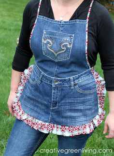 a woman wearing an apron made out of denim