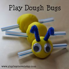 a play dough bug made out of toothbrushes