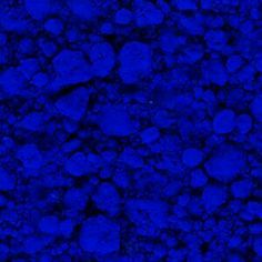 dark blue background with small rocks in the middle