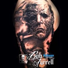 a man with a tattoo on his shoulder has a scary face and two hands holding a knife