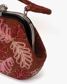 Our intricate, one of a kind vintage bags are estimated to have been produced between the 1970s–2000s. These bags are traditionally paired with kimonos as a luxurious statement piece. However, these versatile pieces may be dressed up or down with daily casual wear. Made in Japan Size: 7.5″ x 10" Product #: AC173 Code: NWS Formal Beaded Shoulder Bag With Top Handle, Formal Beaded Top Handle Shoulder Bag, Evening Top Handle Bag With Beaded Details, Red Beaded Clutch Evening Bag, Red Embellished Shoulder Bag For Formal Occasions, Formal Hand Embellished Shoulder Bag, Elegant Red Beaded Bag, Red Rectangular Clutch With Handwork, Rectangular Red Clutch With Handwork