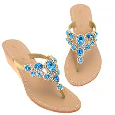 This sandal features a 1.5 inch wedge. Hand-Made & Made to Order (2-4 Weeks) Fits True To Size- If you already own our shoes, stick with the same size Leather Sole and Leather Upper Lined with Suede For Added Comfort Embellished with Czech Crystals & Rhinestone Chain Wooden Wedge 3 Wedge Heights Available: 1.5 Inches, 2.5 Inches, 3 Inches Use Our “Change A Wedge” Button To Select The Wedge Height Of Your Choice Customized Orders are Final Sale Made in Bali, Shipped From Los Angeles ﻿The Bluest b Mystique Sandals, Bridal Flats, Wooden Wedges, Blue Wedges, Jeweled Sandals, Bridal Sandals, Wedding Flats, Rhinestone Chain, Honeymoons