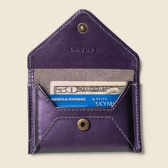 This is a very interesting and unique leather, it has a iridescent effect so the color changes between purple, green and black. It is ever changing and unique just like you. A compact envelope card holder to keep all your cards and cash in one place securely. This color has RFID protection. This handcrafted product was created in California using repurposed leather from factories around Los Angeles. Casupo searches for beautiful leathers all over the world, finding treasures and giving rediscove Belt Organizer, Envelope Wallet, Rfid Wallet, Mini Envelopes, Passport Wallet, Minimalist Wallet, Clip Wallet, Wallet Bag, Toiletry Bags