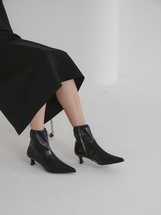 Editor's NoteOI PAINTED's shoe will add elegance to your daily outlook- Modern soft pointed toe - Soft and subtle gloss leather texture- Set on a stacked heel- Basic silhouette with feminine mood- Daily point itemMeasurements (in.)- Heel: 2.0in.- Size: US 5.5(KR225mm) - US 8 (KR250mm)- This item is based on the KR shoe size. Please refer to the size chart.Composition & Care- Upper: Sheepskin- Lining: Synthetic leather- Outsole: Rubber- Professional leather care onlyDesigner- by OI PAINT Fall Kitten Heels With Sculpted Heel And Pointed Toe, Sleek Ankle-high Heels With Sculpted Heel, Kitten Heels With Stacked Heel And Pointed Toe, Chic Pointed Toe Kitten Heels With Stacked Heel, Pointed Toe Boots With Sculpted Heel For Work, Chic Kitten Heels With Pointed Toe And Stacked Heel, Chic Kitten Heels With Stacked Heel And Pointed Toe, Office Heeled Boots With Stacked Heel And Pointed Toe, Office Boots With Padded Heel And Pointed Toe