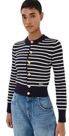 Find AMI Sailor Cardigan on Editorialist. Fabric: Mid-weight knit. Stripe pattern. Crew neck. Long sleeves. Gold-tone button placket. Shell: 85% cotton/15% wool. Hand wash or dry clean. Made in Portugal. Measurements: Measurements from size XS Length: 18.5in / 47.0cm, from shoulder Sailor Cardigan, Striped Outfit, Round Neck Cardigan, Outfit 2023, Zara Cardigan, Long Knitted Dress, Sleeveless Knit Top, Textured Skirt, Knitted Cape