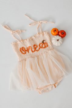 Beautiful one romper for your little pumpkin babe. This listing is for a peach color romper, one lettering in coral and a pumpkin appliqué next to it.  Birthday photoshoots, special events, etc. If you'd like a different color or saying, don't hesitate to contact us One Year Old November Birthday Party, Pumpkin Themed 1st Birthday Party, Onederfall Birthday, Pumpkin One Year Old Pictures, One Year Pumpkin Birthday, One Sweet Pumpkin First Birthday, Pink Pumpkin First Birthday, My Little Pumpkin 1st Birthday Girl, Pumpkin First Birthday Party