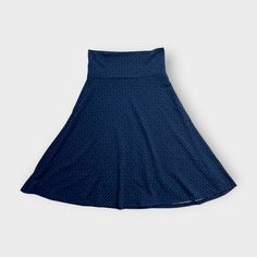 Step into a world of comfort and style with the stunning LuLaRoe Womens Azure Skirt. This exquisite A-Line skirt, adorned in a captivating dark blue with a striking blue diamond print, is crafted from a luxurious blend of polyester and spandex. Feel the soft fabric gently caress your skin as you embrace the versatility of this piece, perfect for any occasion—from casual outings to elegant gatherings.LuLaRoe Azure Skirt Details Size: S Waist: 28 in Color: Dark Blue Pattern: Blue Diamond Style: A- Blue Stretch Skirt With Wide Waistband, Navy Fitted Full Skirt, Fitted Blue Skirt With Wide Waistband, Navy Flowy Midi Skirt, Dark Blue Pattern, Skirt Details, Vintage Trucker Hats, Diamond Print, Hat Shop