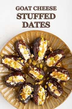 a plate with stuffed dates on it and the words goat cheese stuffed dates above them