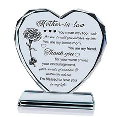 a heart shaped glass award with a poem on the front and bottom, that says mother in law