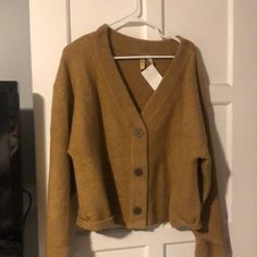 Tan H&M Cardigan, Kinda Baggy In The Sleeves And A Little Shorter Length. 52% Acrylic 30% Polyamide And 15% Wool. 3 Big Buttons On The Front. H&m V-neck Fall Outerwear, H&m Long Sleeve Cardigan For Fall, H&m Long Sleeve Fall Cardigan, Casual H&m V-neck Cardigan, H&m V-neck Cardigan For Spring, H&m V-neck Spring Cardigan, Brown Shawl, Fine Knit Cardigan, Oversized Sweater Cardigan