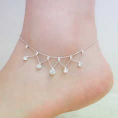 Silver anklet, rhinestone anklet, ankle bracelet, foot jewelry, silver ankle bracelet, anklet, silver rhinestone ankle bracelet This is a beautiful gold anklet. It can add you a lot of shine and sparkles. It is also a perfect gift for bridesmaid. Chain Size: 8 inch + 2 inch extend chain Your jewelry comes in a gift box, and ready for your special presentation. PLEASE NOTE - The photo is a representation of what will be custom made for you. Each handmade jewelry will be slightly different. Shippi Name Anklet, Silver Chain Anklet, Rose Gold Anklet, Rhinestone Anklet, Turquoise Anklet, Star Anklet, Diamond Anklet, Anklet Silver, Silver Ankle Bracelet