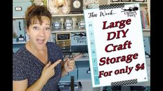 a woman pointing at a large craft storage sign