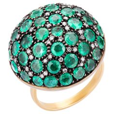 In this beautifully styled Victorian ring round cut emeralds, totaling 6.04Cts are accentuated with diamonds in an elegantly crafted circular dome. Crafted in 18K gold and 925 sterling silver, this ring is the perfect cherry on top of your cocktails! Please follow the Luxury Jewels storefront to view the latest collections & exclusive one of a kind pieces. Luxury Jewels is proudly rated as a Top Seller on 1stDibs with all 5 star customer reviews. JEWELRY SPECIFICATION : Approx. Gold Weight: 1.84 Victorian Diamond Ring, Sapphire Cocktail Ring, Victorian Ring, Dome Ring, Victorian Rings, Diamond Cocktail Rings, Diamonds And Gold, Cherry On Top, Domed Ring