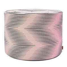 a large pink and black basket with stripes on it's sides, sitting in front of a white background