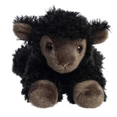 a stuffed animal that is black with brown fur on it's head and ears