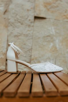 Bridal shoes 'Regina' are handcrafted from soft white Italian suede with handmade lace embroidery on soft mesh and have a 5.5 cm / 2.2 inches low block heel.  These wedding sandals feature a comfortable double ankle strap and sturdy heels. These shoes for the bride can also be made with kitten heels and in almost any color.  Inside there is a soft memory foam insole, which gives a feeling of additional comfort when walking. Tunit outsole is made of a mixture of leather chips and rubber, it's mor Summer Lace Wedding Shoes With Low Heel, Spring Wedding Shoes With Lace And Ankle Strap, Spring Wedding Shoes With Ankle Strap In Lace, Spring Lace Wedding Shoes With Ankle Strap, Spring Wedding Shoes With Lace For Ceremony, Spring Wedding Shoes In Lace For Ceremony, Spring Wedding Lace Shoes For Ceremony, Spring Wedding Ceremony Shoes In Lace, White Embroidered Round Toe Heels