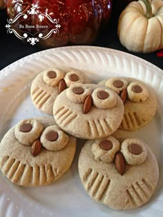 some cookies are sitting on a white plate