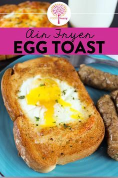 an egg toast on a blue plate with sausages and eggs in the background text overlay reads our frozen egg toast