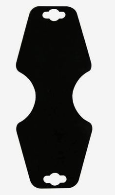 a black plastic object with two holes in the middle and one hole at the top