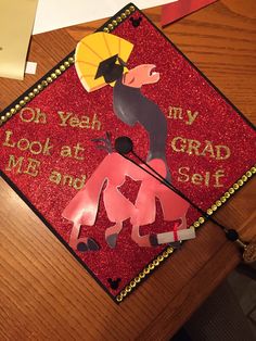 a decorated graduation cap that says, oh yeah my graduate looks at me and self