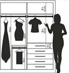 a woman standing in front of a clothes rack