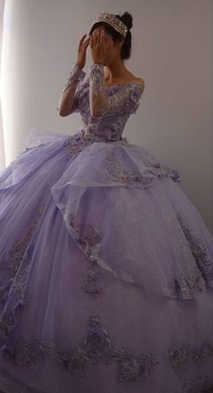 Welcome to Couture Candy's exclusive collection of purple Quinceañera gowns for the 2024 season. Our selection of dresses is expertly made to make every young woman feel exceptional on her milestone day. Our selection includes everything, whether you're searching for something traditional with intricate needlework or something more contemporary with streamlined, clean lines. Purple Princess Dress, Robes Quinceanera, Purple Ball Gown, Purple Quinceanera Dresses, Quinceanera Themes Dresses, Ball Gown Prom Dress, Purple Princess, Dress Quinceanera, Pretty Quinceanera Dresses