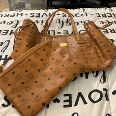 Brand New Medium Mcm Tote And Pouch, In Perfect Condition Inside And Out. Mcm Outfit, Mcm Tote Bag, Tote Bag Outfit, Bag Outfit, Mcm Bags, New Media, Black Tan, Black And Tan, Bag Lady