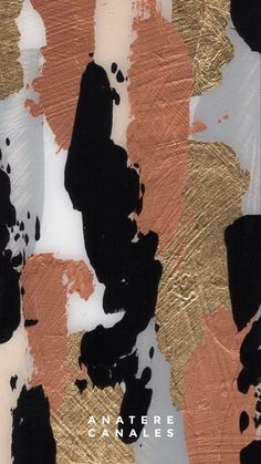 an abstract painting with gold and black paint