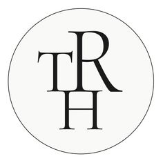 the letter rh in black and white on a round circle with an oval border