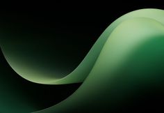 an abstract green background with wavy lines in the center and bottom half, on a black background