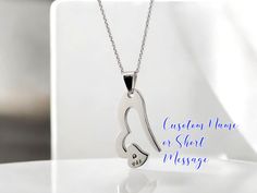 Personalize it with a name or a short message to make it truly yours or gift it to someone special. This Stainless Steel open heart pendant necklace becomes a wearable keepsake. Perfect for adding a touch of bold elegance to any outfit. Silver, gold or Black tone option available.  Durable Material: Made from premium 316L stainless steel, this pendant is resistant to tarnish and corrosion, ensuring it remains beautiful for years to come. Product Details: Material: 316L Stainless Steel Pack: OPP Personalized Stainless Steel Heart Necklace, Personalized Silver Heart Necklace In Stainless Steel, Customized Silver Heart Necklace For Anniversary, Customized Silver Charm Necklaces For Valentine's Day, Personalized Open Heart Stainless Steel Necklace, Personalized Stainless Steel Heart Charm Necklace, Customized Sterling Silver Heart Charm Necklace, Personalized Heart Pendant Promise Jewelry, Personalized Heart Pendant Necklace For Promise