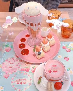 two plates with desserts and drinks on them