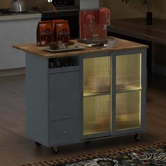 a kitchen cart with food on it in the middle of a floored room next to a stove