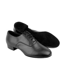 A pair of black leather Formal Leather Dance Shoes With Leather Sole, Classic Dance Shoes With Leather Sole For Galas, Classic Dance Shoes With Leather Sole Almond Toe, Leather Dance Shoes With Leather Sole For Galas, Fitted Leather Dance Shoes With Rubber Heel Cap, Formal Dance Shoes With Leather Sole And Round Toe, Classic Closed Toe Dance Shoes With Rubber Sole, Classic Closed Toe Dance Shoes With Leather Sole, Leather Dance Shoes With Almond Toe And Branded Insole