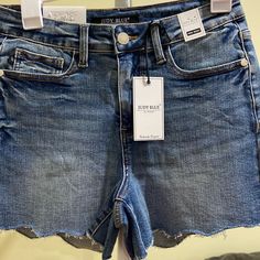 These Judy Blue Scalloped Hem Shorts Are Perfect For Spring. Blue Mid-rise Bottoms For Day Out, Blue Mid-rise Shorts For A Day Out, High Rise Blue Jean Shorts For Day Out, High-rise Blue Jean Shorts For Day Out, Blue High Rise Jean Shorts For Day Out, High Rise Blue Shorts For Day Out, Scalloped Shorts, Scalloped Hem, Blue Shorts