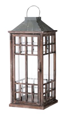 an old wooden lantern with glass panels on the top and bottom, isolated against a white background