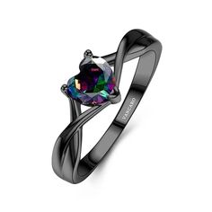 a black gold ring with a rainbow colored diamond