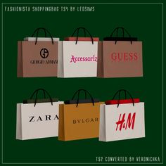 four shopping bags with different logos on them, all in different colors and sizes are shown