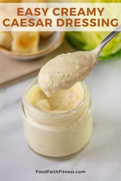 a spoon full of homemade creamy caesar dressing