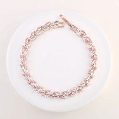 "Bridesmaid bracelet, the perfect gift for bride or for bridesmaid. Paid with earring and necklace to make it a complete set♥   ❤️Best Quality ❤️Best Pricing❤️Best Customer Service   🖤Specification For Bracelet: * Length: 6.69\" (17 cm) * Width: 0.23\" (0.6 cm) * Weight: 13g * Metal Type: Silver, Gold Plated, Rose Gold Plated * Stone: AAA Cubic Zirconia 🖤 Hypoallergenic, lead-free & nickel-free. 🖤Packaging: Comes in a gift box, an organza bag (as shown in the last picture) and a message card Elegant Charm Bangle Bracelet For Weddings, Elegant Bangle Charm Bracelet For Weddings, Adjustable Rose Gold Tennis Bracelet For Wedding, Elegant Rose Gold Charm Bracelet For Wedding, Rose Gold Bangle Tennis Bracelet For Wedding, Adjustable Rose Gold Charm Bracelet For Wedding, Elegant Rose Gold Chain Bracelet For Wedding, Elegant Bridesmaid Bracelets, Silver Charm Bracelet For Wedding