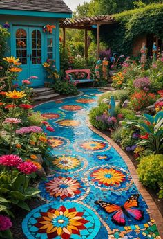 a garden with colorful flowers and butterflies painted on the ground next to a gazebo