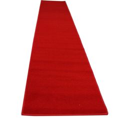 a long red carpeted runner on a white background with no people in the room